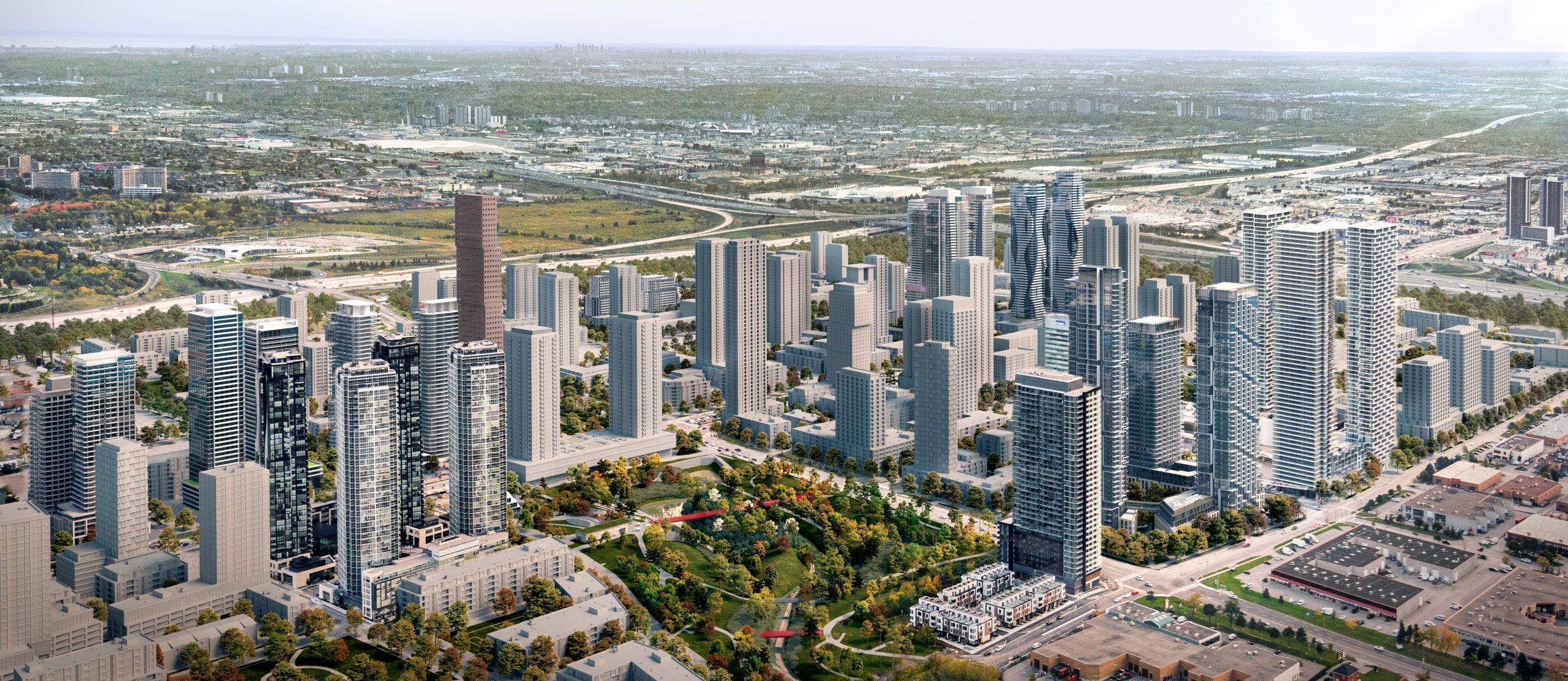 Aerial view of a modern cityscape with high-rise buildings surrounding a central green park with walking paths.